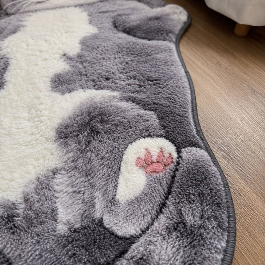 Charmanter Teppich in Form einer schlafenden Katze